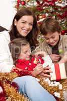 Happy family: mother with son and daughter