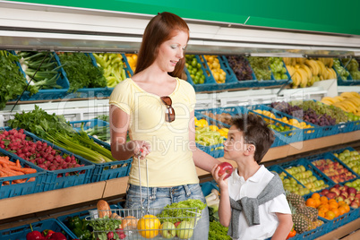 Grocery store shopping - Red hair woman with child