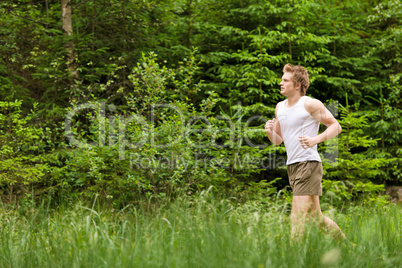 Young man jogging in nature