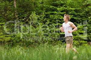 Young man jogging in nature