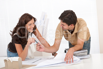 Man and woman at architect office