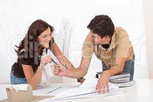 Man and woman at architect office