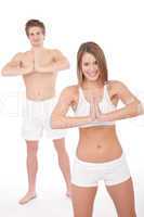 Fitness - Healthy couple stretchin in yoga position