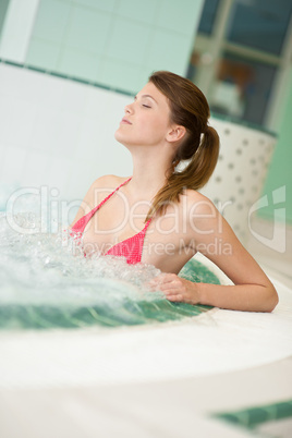 Swimming pool - beautiful woman in bikini