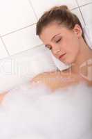 Body care series - Woman lying in the bathtub
