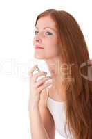Body care series - Young red hair woman applying perfume