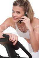 Fitness series - Woman holding mobile phone