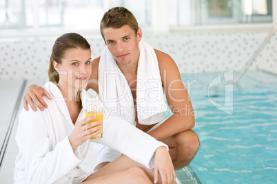 Young sportive couple relax at swimming pool