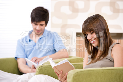 Student - two teenager reading book home