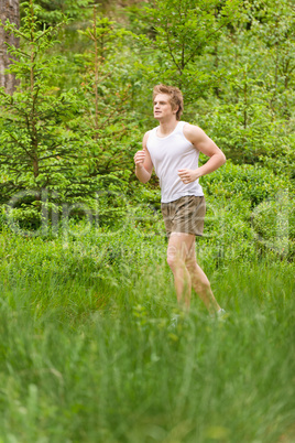 Young man jogging in nature