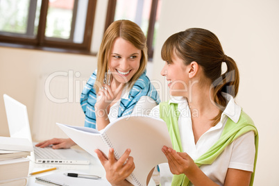 Student at home - two happy woman with laptop