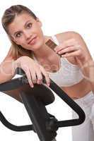 Fitness series - Woman holding piece of chocolate