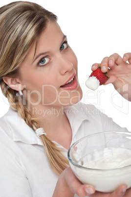 Healthy lifestyle series - Woman eating strawberry and yogurt