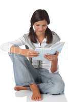 Attractive teenager reading book