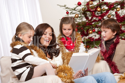 Happy family: mother with three children