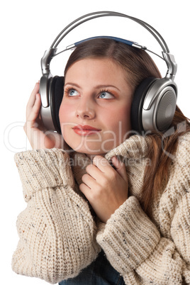 Portrait of happy woman enjoying music with headphones