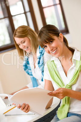 Student at home - two happy woman with laptop