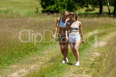 Female couple walking in nature