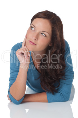 Portrait of woman thinking watching up