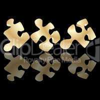 Gold puzzle pieces