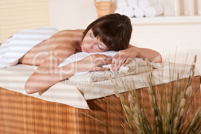 Spa - Young female client at wellness massage