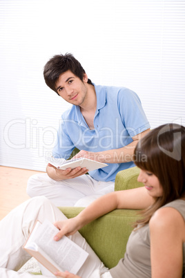 Student - two teenager reading book home