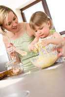 Baking - Woman with child preparing dough