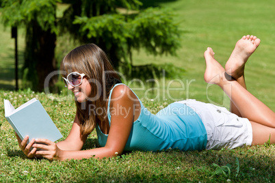 Relax in park - woman with book on sunny day