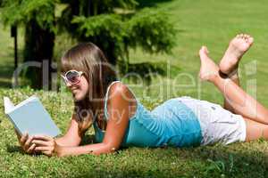 Relax in park - woman with book on sunny day