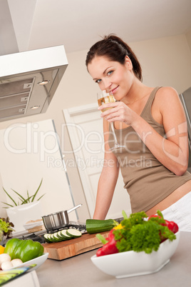 Smiling young woman the kitchen