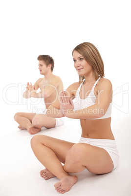 Fitness - Healthy couple stretchin in yoga position