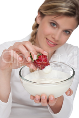 Healthy lifestyle series - Woman with strawberry and yogurt