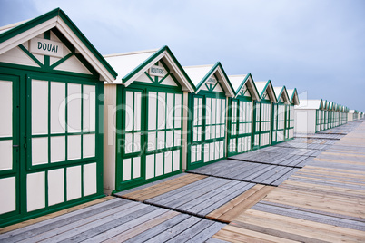 Wide angle view of wooden beach huts