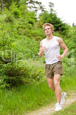 Young man jogging in nature