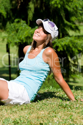 Happy woman enjoy sun in park