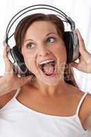 Brown hair woman enjoying music