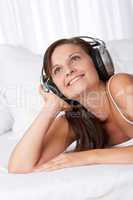 Brown hair smiling woman with headphones