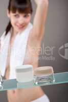 Body care: Young woman in bathroom