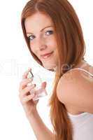 Body care series - Smiling young woman with perfume