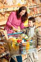 Grocery store shopping - Woman with child