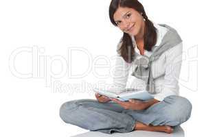 Brown hair teenager holding book