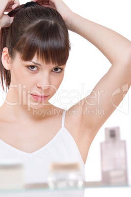 Body care: Portrait of young woman in bathroom
