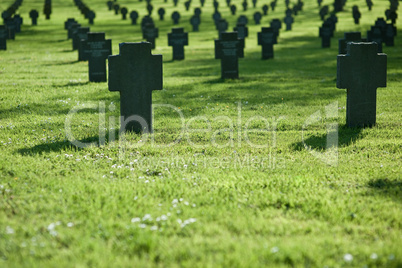 Cemetery with grass in sunset