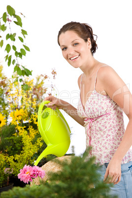 Gardening - woman with watering can and flowers