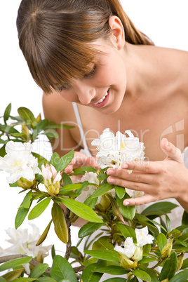 Gardening - Portrait of woman with Rhododendron