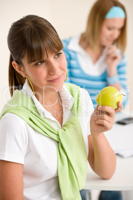 Student at home - happy woman with apple