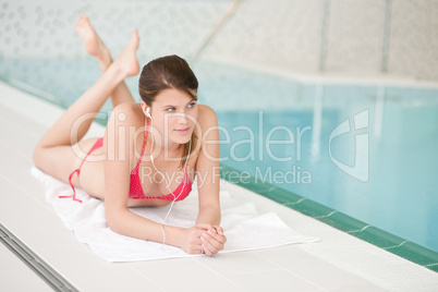 Swimming pool - beautiful woman relax listen to music