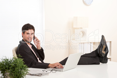 Successful businessman on the phone