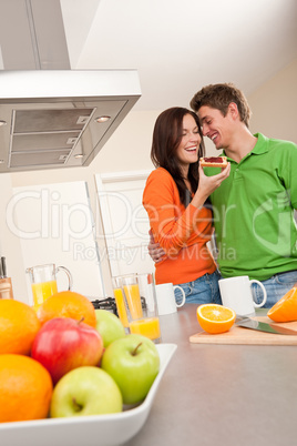 Young man and woman eating toast