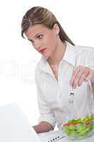 Healthy lifestyle series - Woman eating salad at office